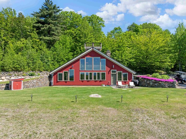 151 Brock Hill Rd, Bridgewater, NH 03222 - rustic home with a front yard and a chimney