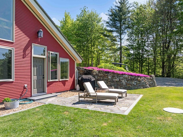 151 Brock Hill Rd, Bridgewater, NH 03222 - view of green lawn featuring a patio area