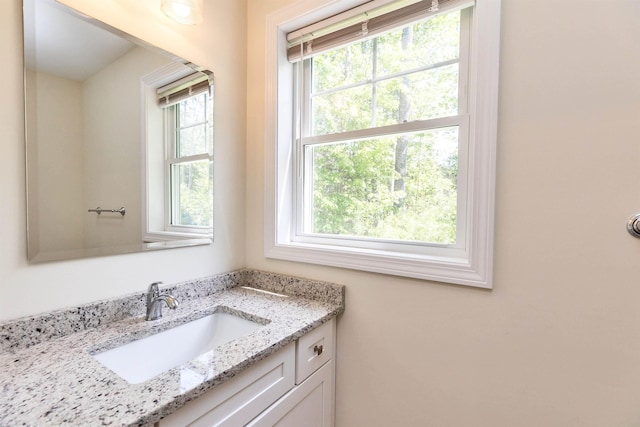 264 Woodview Way, Manchester, NH 03102 - bathroom with plenty of natural light and vanity