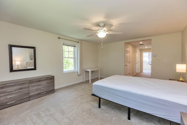 264 Woodview Way, Manchester, NH 03102 - bedroom featuring light carpet, baseboards, and a ceiling fan