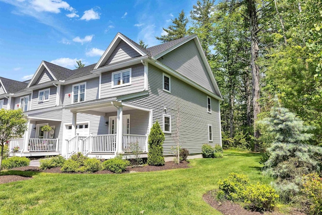 264 Woodview Way, Manchester, NH 03102 - view of front of home with a porch and a front lawn