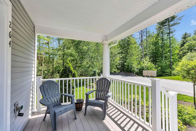 264 Woodview Way, Manchester, NH 03102 - porch featuring view of scattered trees and a yard
