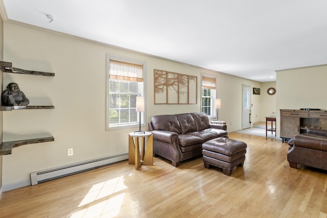 12 Old Fort Ln, Dunbarton, NH 03046 - living area featuring baseboard heating, light wood-style flooring, and baseboards