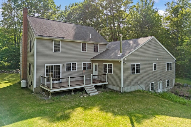 12 Old Fort Ln, Dunbarton, NH 03046 - back of property with a chimney, a lawn, a shingled roof, and a wooden deck