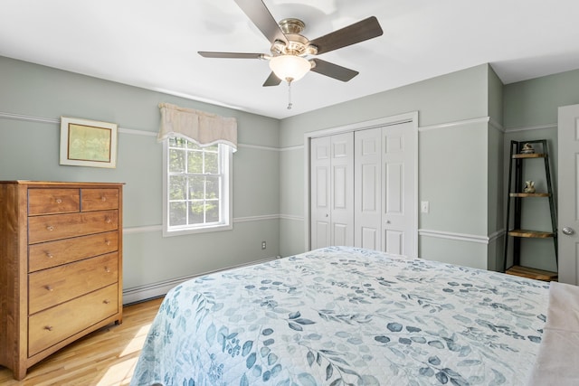 12 Old Fort Ln, Dunbarton, NH 03046 - bedroom featuring light wood-type flooring, a closet, baseboard heating, and ceiling fan