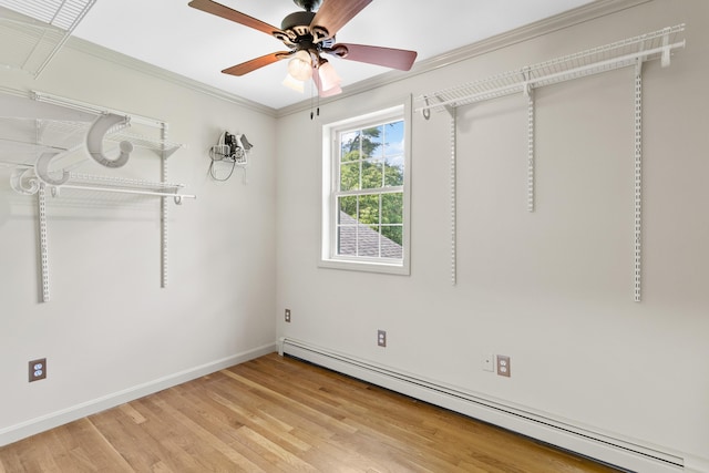 12 Old Fort Ln, Dunbarton, NH 03046 - unfurnished bedroom featuring a baseboard heating unit, baseboards, light wood finished floors, crown molding, and ceiling fan