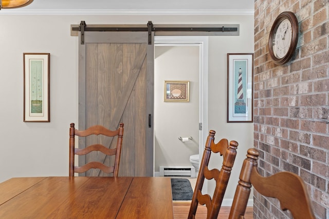 14 Hideaway Ln, Williston, VT 05495 - dining room featuring a barn door, baseboard heating, and crown molding