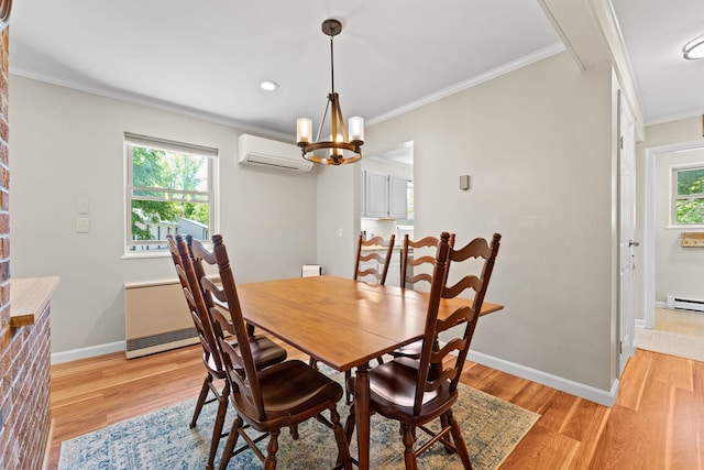 14 Hideaway Ln, Williston, VT 05495 - dining room featuring an AC wall unit, light wood-type flooring, ornamental molding, a chandelier, and baseboards