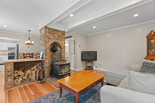 14 Hideaway Ln, Williston, VT 05495 - living room with light wood-style flooring, recessed lighting, ornamental molding, a chandelier, and baseboards