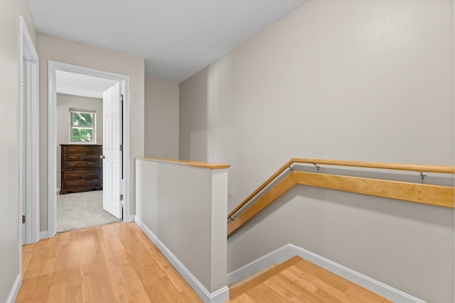 14 Hideaway Ln, Williston, VT 05495 - corridor featuring an upstairs landing, light wood-style floors, and baseboards