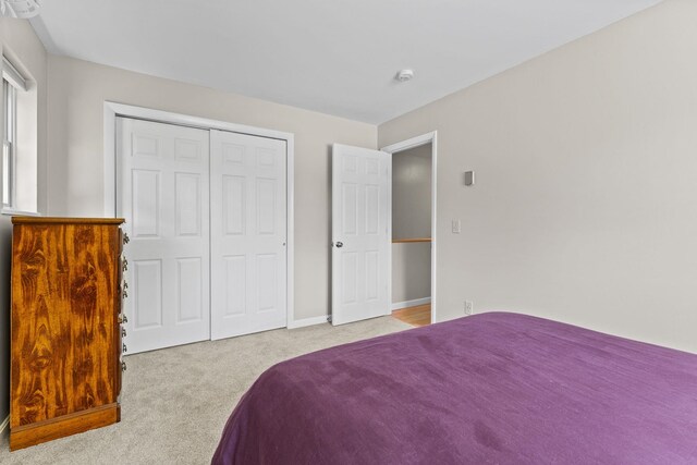 14 Hideaway Ln, Williston, VT 05495 - carpeted bedroom featuring a closet and baseboards