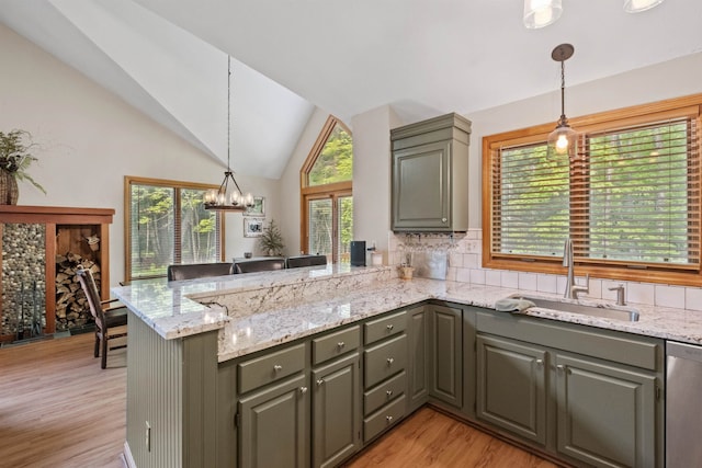 10 Mountain Brook Cir Unit 2, Lincoln, NH 03251 - kitchen featuring a sink, gray cabinets, dishwasher, a peninsula, and light wood-style floors