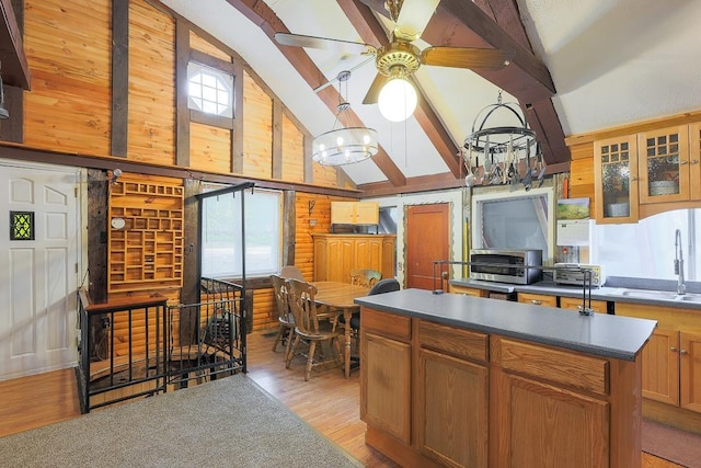 594 Suncook Valley Rd, Alton, NH 03809 - kitchen featuring a sink, light wood finished floors, high vaulted ceiling, a chandelier, and a ceiling fan