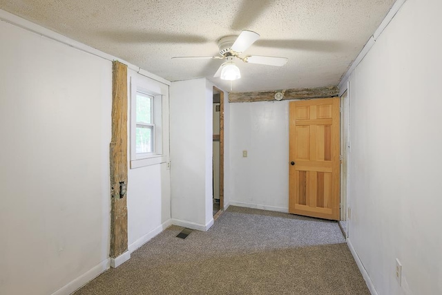 594 Suncook Valley Rd, Alton, NH 03809 - carpeted empty room featuring a textured ceiling, a ceiling fan, and baseboards
