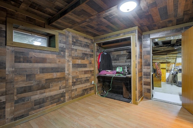 594 Suncook Valley Rd, Alton, NH 03809 - below grade area featuring wooden walls, wood ceiling, and wood finished floors