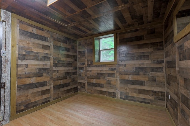 594 Suncook Valley Rd, Alton, NH 03809 - below grade area with wood ceiling, wood walls, a relaxing sauna, and wood finished floors