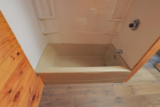 594 Suncook Valley Rd, Alton, NH 03809 - full bath with wood finished floors and shower / washtub combination