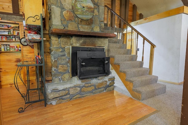 594 Suncook Valley Rd, Alton, NH 03809 - staircase featuring wood finished floors and a fireplace