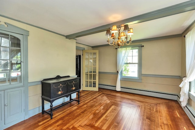 3 Foundry St, Amherst, NH 03031 - dining room with ornamental molding, a baseboard radiator, and a chandelier