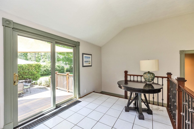 3 Foundry St, Amherst, NH 03031 - dining space with vaulted ceiling, light tile patterned flooring, and baseboards