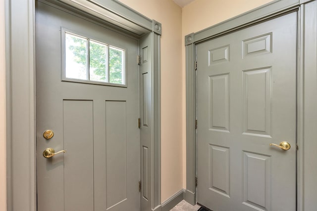 3 Foundry St, Amherst, NH 03031 - doorway to outside featuring baseboards