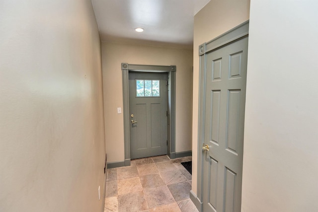 3 Foundry St, Amherst, NH 03031 - entryway featuring baseboards, light stone finish floors, and recessed lighting