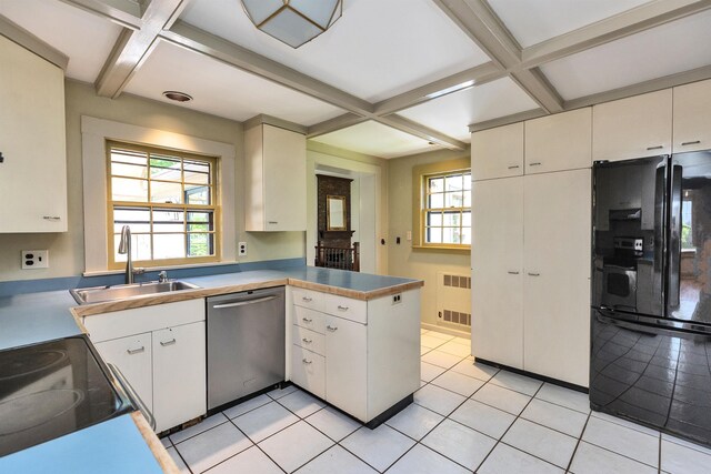 3 Foundry St, Amherst, NH 03031 - kitchen featuring freestanding refrigerator, stainless steel dishwasher, coffered ceiling, a sink, and radiator heating unit