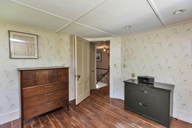 3 Foundry St, Amherst, NH 03031 - bedroom with wallpapered walls and dark wood-style flooring