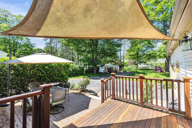 3 Foundry St, Amherst, NH 03031 - wooden deck featuring a patio area and outdoor dining area