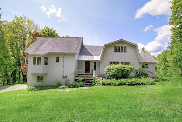 1065 Center Fayston Rd, Fayston, VT 05660 - view of front of home with roof with shingles and a front lawn