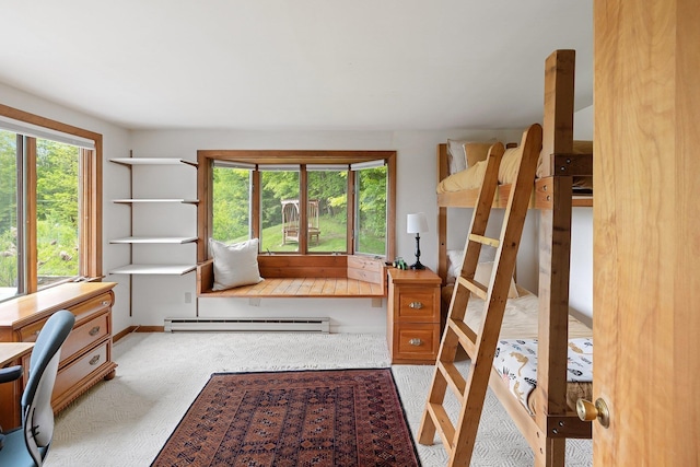 1065 Center Fayston Rd, Fayston, VT 05660 - carpeted bedroom with a baseboard heating unit and an office area