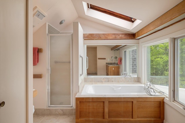 1065 Center Fayston Rd, Fayston, VT 05660 - bathroom with a skylight, a stall shower, a garden tub, and vaulted ceiling