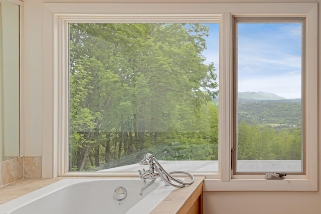 1065 Center Fayston Rd, Fayston, VT 05660 - bathroom with a tub and a mountain view