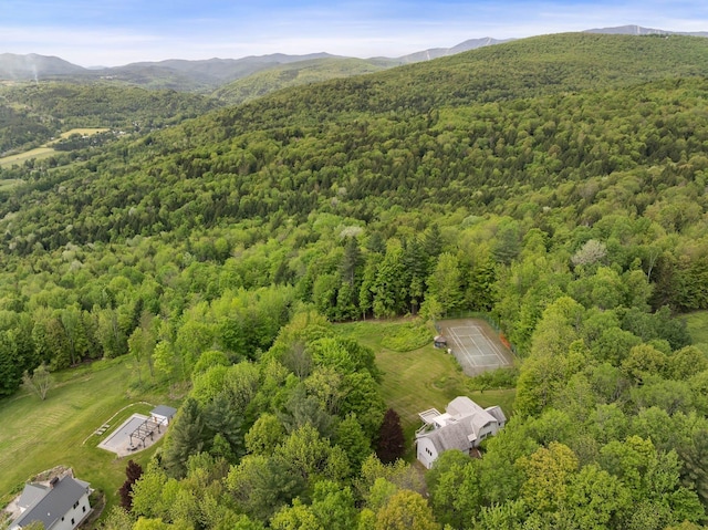 1065 Center Fayston Rd, Fayston, VT 05660 - aerial view of property and surrounding area featuring a heavily wooded area and a mountain backdrop