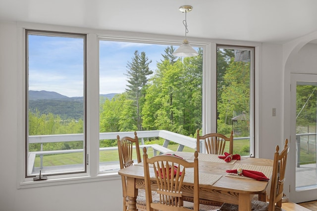 1065 Center Fayston Rd, Fayston, VT 05660 - dining space featuring arched walkways and a mountain view