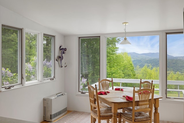 1065 Center Fayston Rd, Fayston, VT 05660 - dining space featuring heating unit and a mountain view