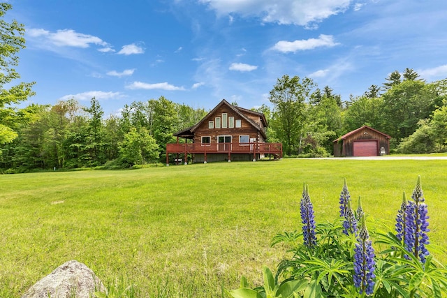 201 Deering Center Rd, Deering, NH 03244 - view of grassy yard featuring a garage, an outdoor structure, and a wooden deck