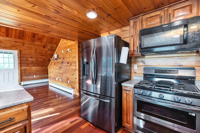201 Deering Center Rd, Deering, NH 03244 - kitchen with stainless steel appliances, a baseboard heating unit, wooden walls, dark wood-style floors, and wooden ceiling