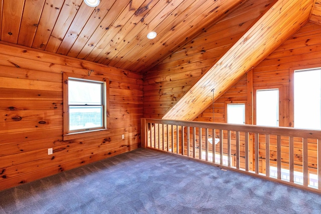 201 Deering Center Rd, Deering, NH 03244 - additional living space with lofted ceiling, carpet, and wooden walls