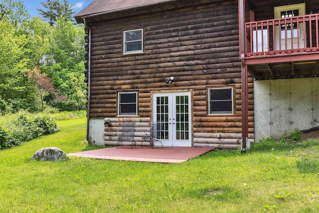 201 Deering Center Rd, Deering, NH 03244 - rear view of house with french doors, a yard, log siding, and a patio