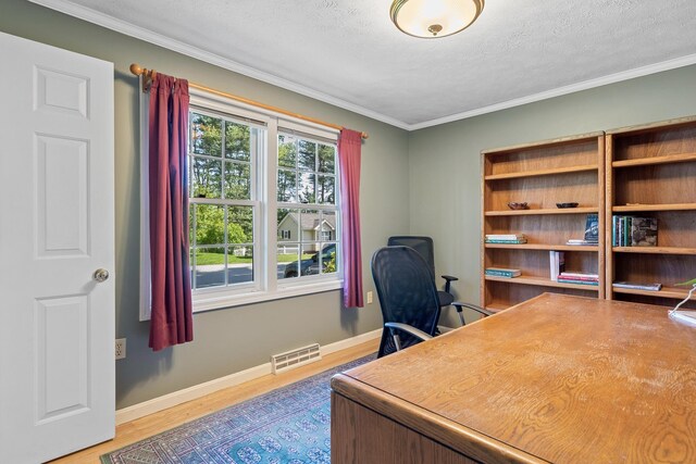 4 Edith Ave, Nashua, NH 03064 - office space featuring wood finished floors, baseboards, ornamental molding, and a textured ceiling
