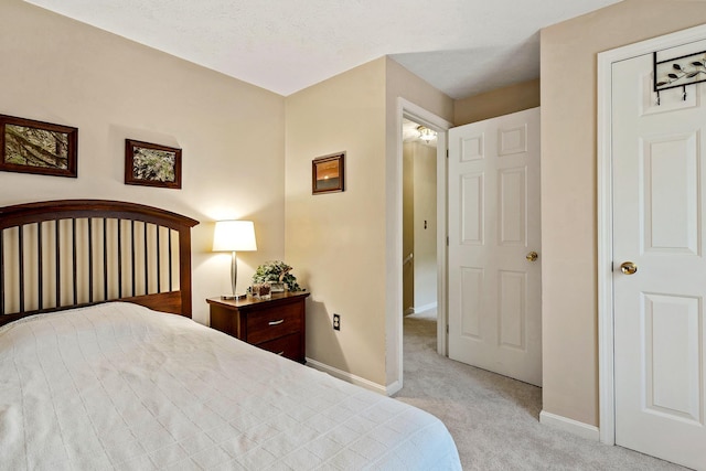 4 Edith Ave, Nashua, NH 03064 - bedroom with carpet floors and baseboards