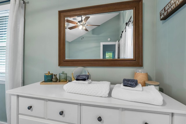6 Chalet Dr, Gilford, NH 03249 - bathroom featuring lofted ceiling, a ceiling fan, and vanity
