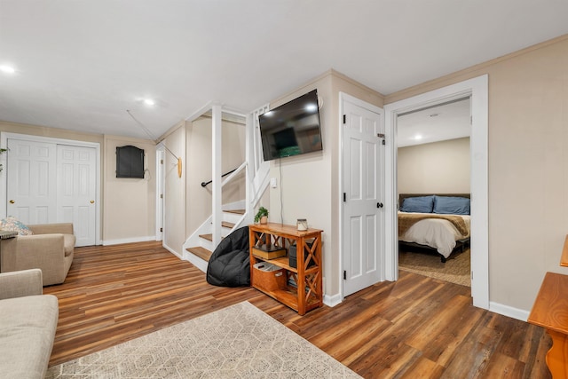 6 Chalet Dr, Gilford, NH 03249 - living room with wood finished floors, baseboards, stairs, and recessed lighting