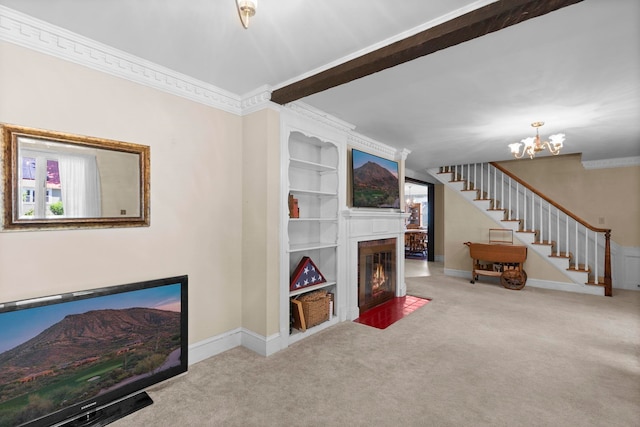 3 Patton St, Rochester, NH 03867 - carpeted living area with a fireplace with flush hearth, built in features, a chandelier, stairs, and crown molding