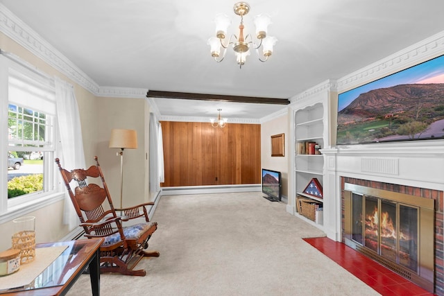 3 Patton St, Rochester, NH 03867 - sitting room with a chandelier, a fireplace, carpet floors, and built in features