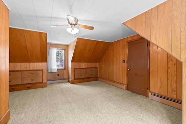 3 Patton St, Rochester, NH 03867 - bonus room with a baseboard heating unit, carpet floors, and wooden walls