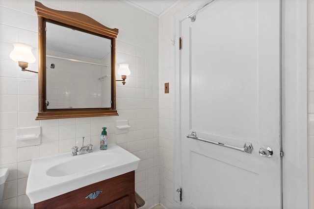 3 Patton St, Rochester, NH 03867 - bathroom featuring tile walls, vanity, and crown molding