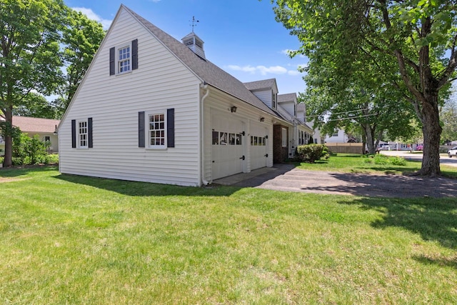 3 Patton St, Rochester, NH 03867 - view of home's exterior with an attached garage, driveway, roof with shingles, a yard, and a chimney