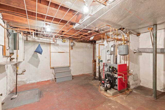 3 Patton St, Rochester, NH 03867 - unfinished basement with a heating unit